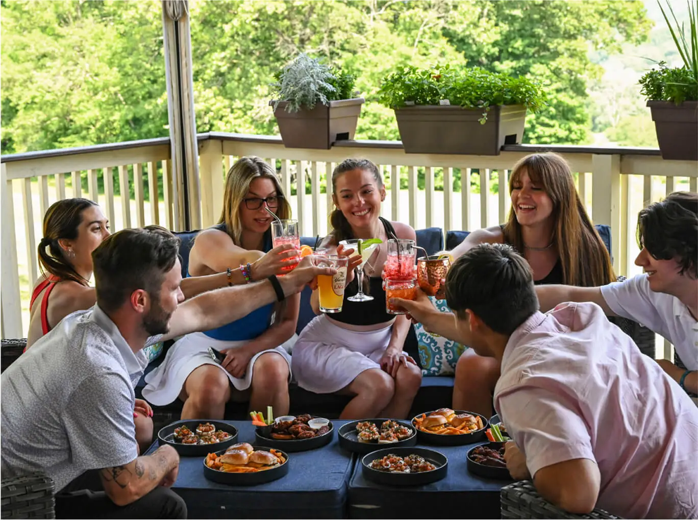 A group of people eating and having fun at Great Gorge Hef's Hut, Vernon NJ.