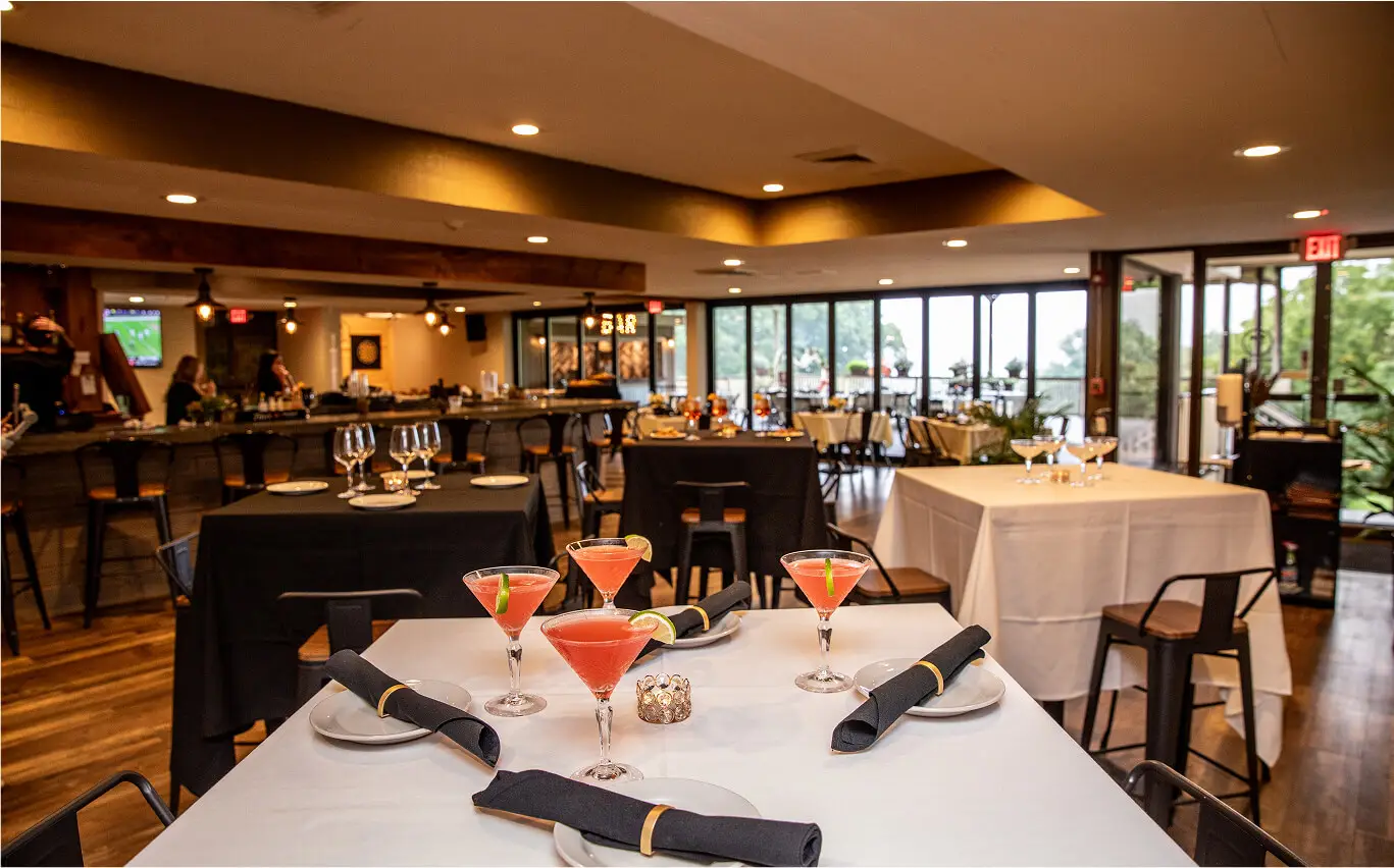 Interior of Hef's Hut in Vernon, NJ, elegantly decorated for a private event with neatly arranged tables, ambient lighting, and festive table settings.